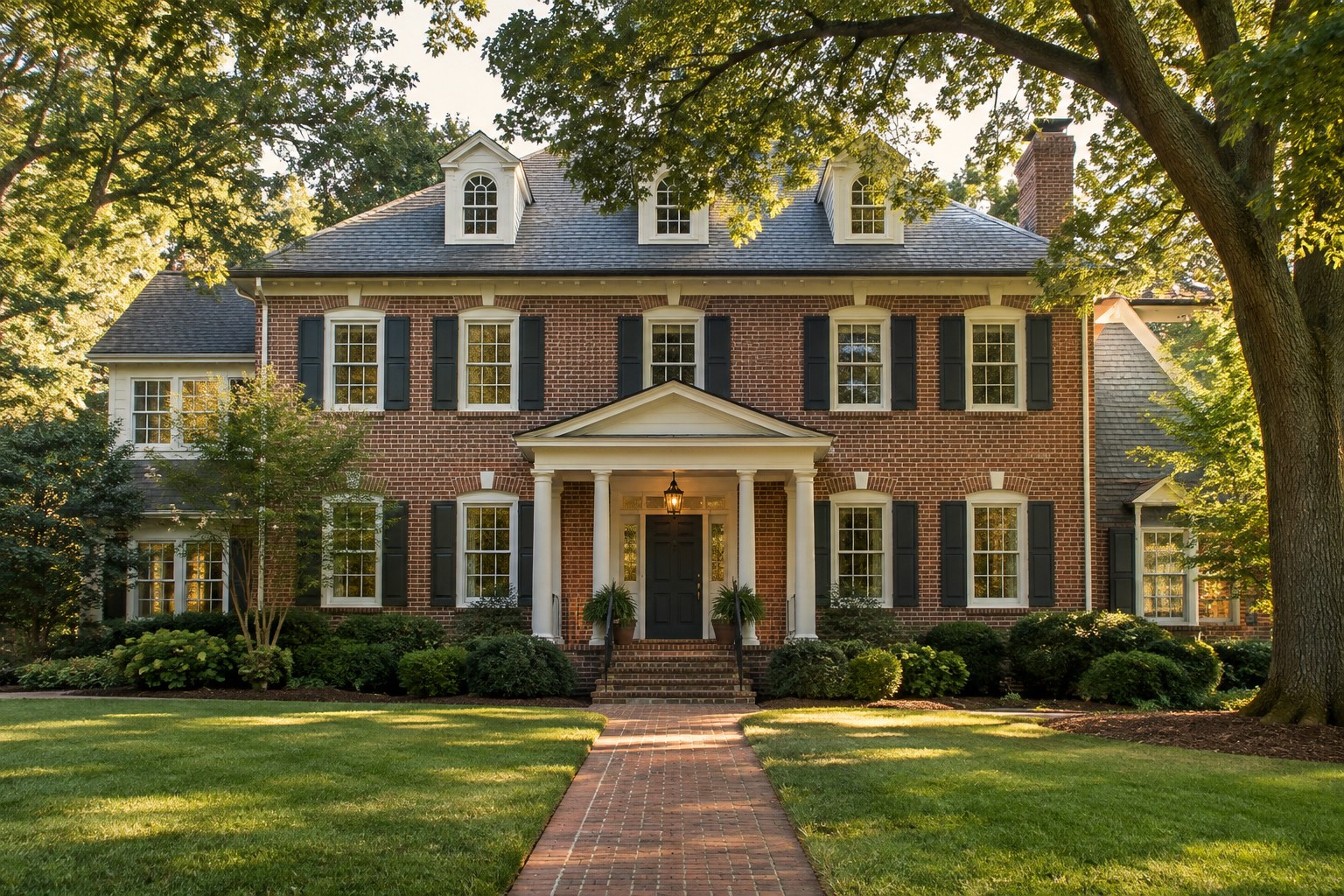 A Virginia brick colonial home in warm evening light